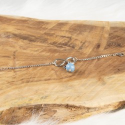 Détail de l'ensemble du bracelet, symbole infini, perle polymère et chaine gourmette. Modèle A
