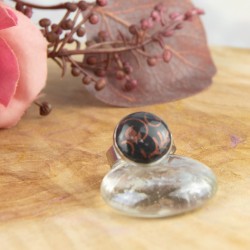 Bague “Volutes de Cuivre” – un bijou baroque chic et moderne.